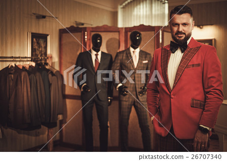Extravagant stylish man in tailor studio 26707340