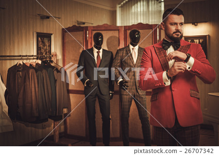 Extravagant stylish man in tailor studio 26707342