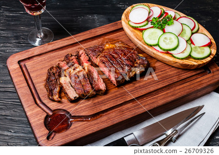 sliced medium rare grilled Beef steak Ribeye 26709326