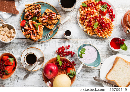 Breakfast table with waffles 26709549