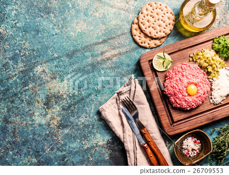 Beef tartare on cutting board Beef tartare on cutting board 26709553