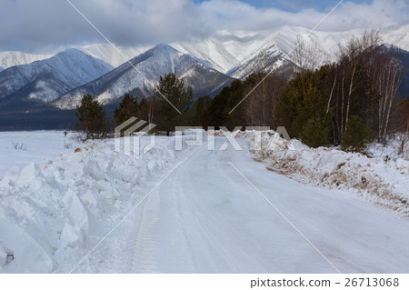 Snow-covered road in Trans-Baikal National Park. Snow-covered road in Trans-Baikal National Park. 26713068