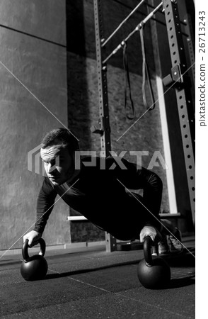 Hard working professional weightlifter doing push Hard working professional weightlifter doing push 26713243
