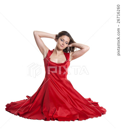 Beautiful woman sitting on the floor Beautiful woman sitting on the floor 26716260