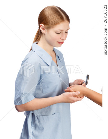Young beautiful smiling woman neurologist in blue doctor's smock 26716522