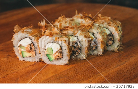 sushi set on a wooden tray 26717922