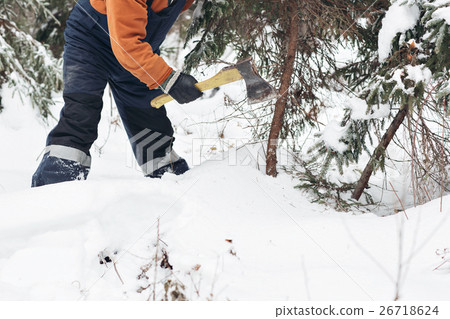 man with hatchet in the hands of cuts Christmas man with hatchet in the hands of cuts Christmas 26718624