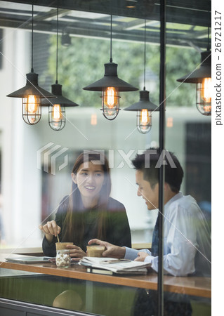Asian business people meeting in a cafe. 26721217