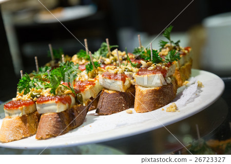 Pinchos on a plate 26723327