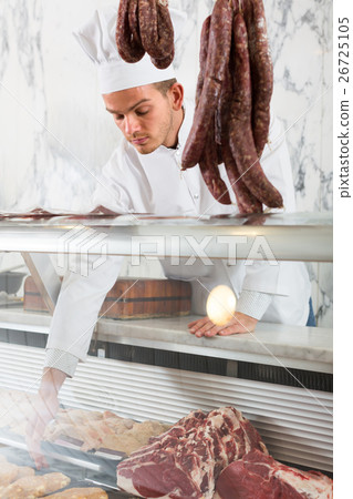 Positive professional cook laying out food Positive professional cook laying out food 26725105