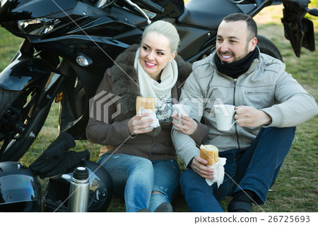 young adults drinking coffee young adults drinking coffee 26725693