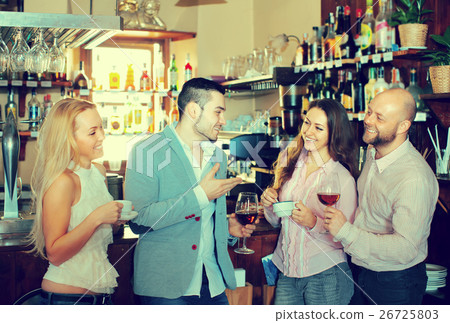 Young adults in bar Young adults in bar 26725803
