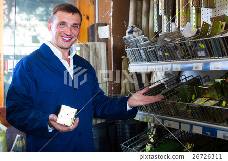 workman holding metal furniture workman holding metal furniture 26726311