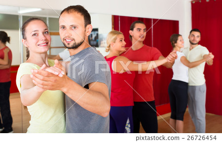Pair dancing tango in dancing studio 26726454