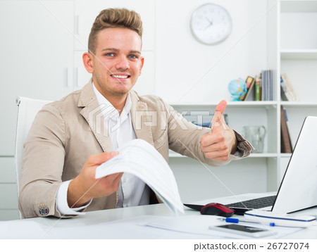 Businessman with paperwork and thumb up Businessman with paperwork and thumb up 26727074