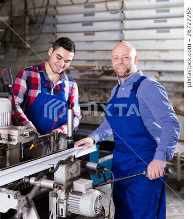 workers near milling machine workers near milling machine 26727266