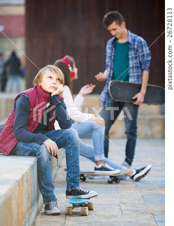 Jealous teen and his friends after conflict 26728113