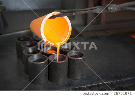Smelting gold at a factory Smelting gold at a factory 26731971