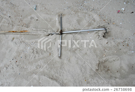 Anchor in the sand on the beach Anchor in the sand on the beach 26738698