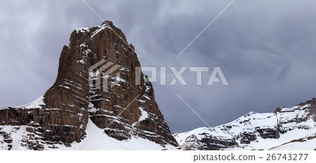 Panoramic view on snow rocks and grey sky Panoramic view on snow rocks and grey sky 26743277