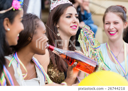 Girls having drink together on bachelorette party 26744218