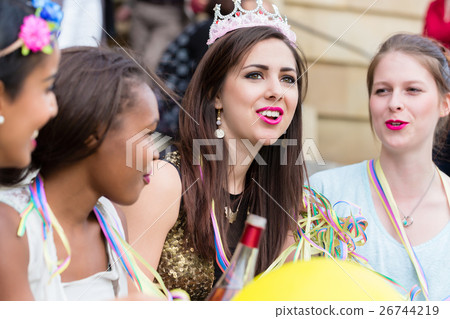 Girls having drink together on bachelorette party 26744219