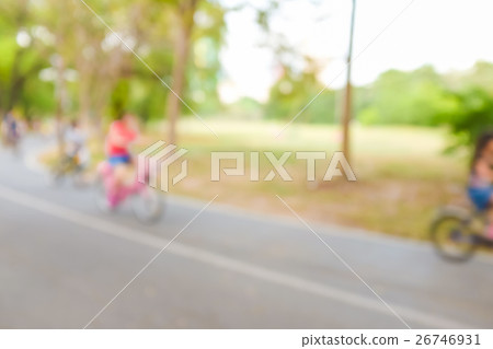 Blurred green background of activities in park 26746931