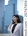 Asian businesswoman talking on smart phone. 26747404
