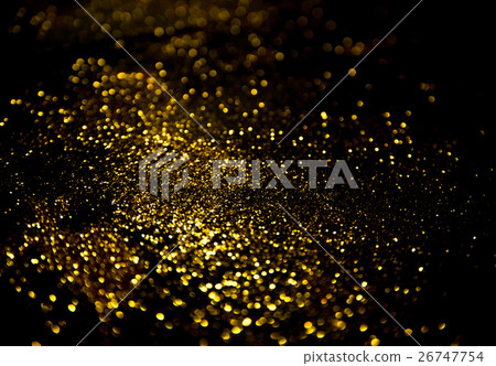 gold glitter lights on black background. 26747754