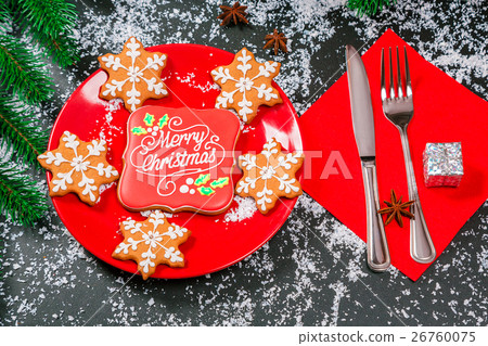 Beautifully laid Christmas table with gingerbread 26760075