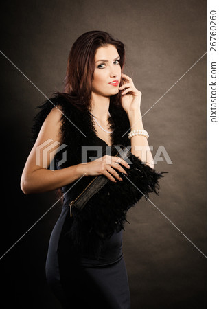 woman evening dress handbag in hand on black woman evening dress handbag in hand on black 26760260