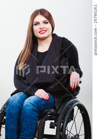 Disabled young girl on wheelchair. Disabled young girl on wheelchair. 26760261