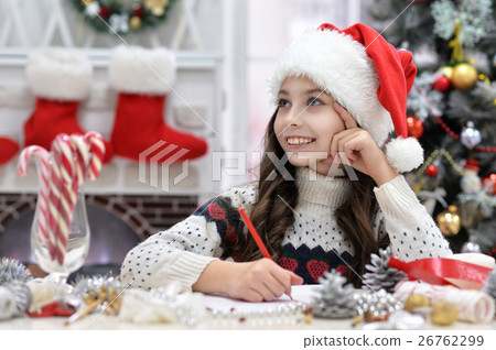 Girl writing letter Girl writing letter 26762299