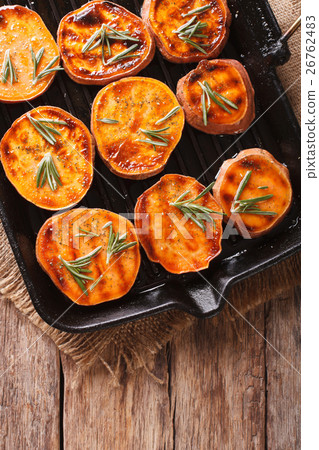 Grilled sweet potatoes with rosemary 26762483