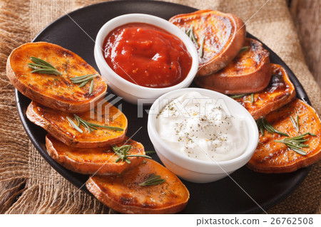 Grilled sweet potatoes with rosemary 26762508