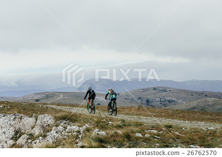 two athletes cyclists two athletes cyclists 26762570