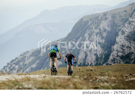 two athletes cyclists 26762572