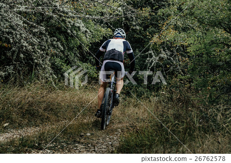 athlete a cyclist on mountainbike 26762578
