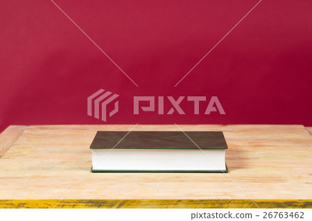 Book on wooden table. Back to school. Copy space 26763462