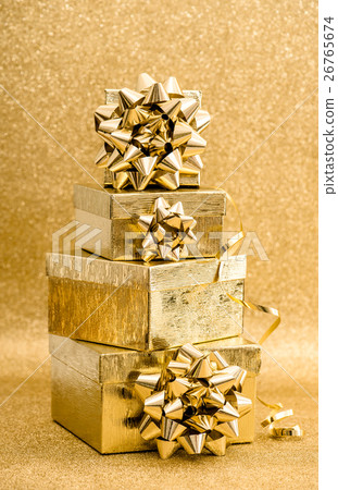 Gift box ribbon on golden background Holidays deco Gift box ribbon on golden background Holidays deco 26765674