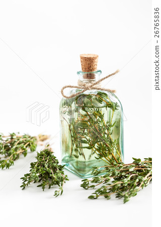 Thyme essential oil or infusion and healing herbs 26765836