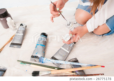 Painter working with dye on floor, top view 26775178
