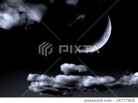 The moon in the night sky in clouds 26777808