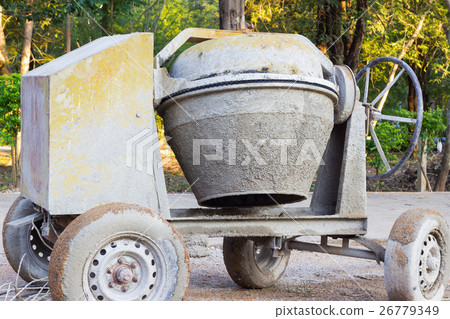 closeup cement mixer on the construction site closeup cement mixer on the construction site 26779349
