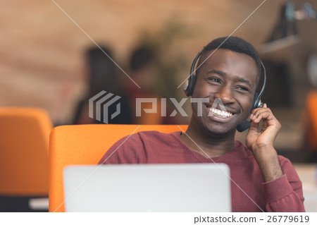 Customer Service agent in an startup office with 26779619