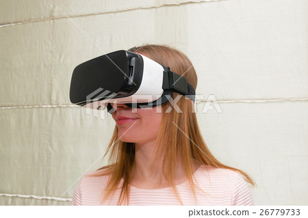 Girl in a virtual reality. 26779733
