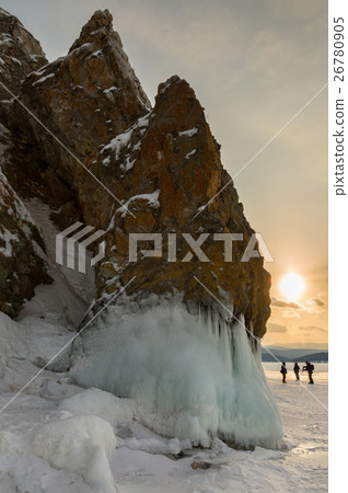 Beautiful icicles on rocks at sunrise. Winter Beautiful icicles on rocks at sunrise. Winter 26780905