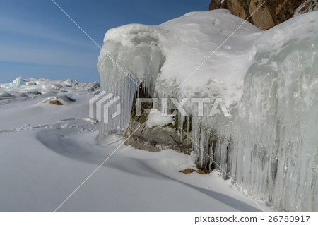 Beautiful icicles on rocks. Winter landscape in Beautiful icicles on rocks. Winter landscape in 26780917