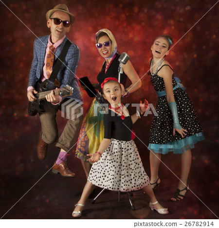 Rock musician family having fun 26782914