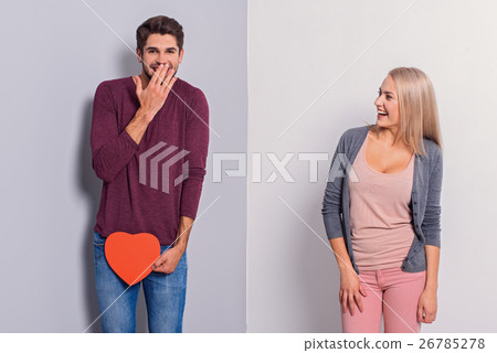 Cheerful couple expressing their feelings Cheerful couple expressing their feelings 26785278